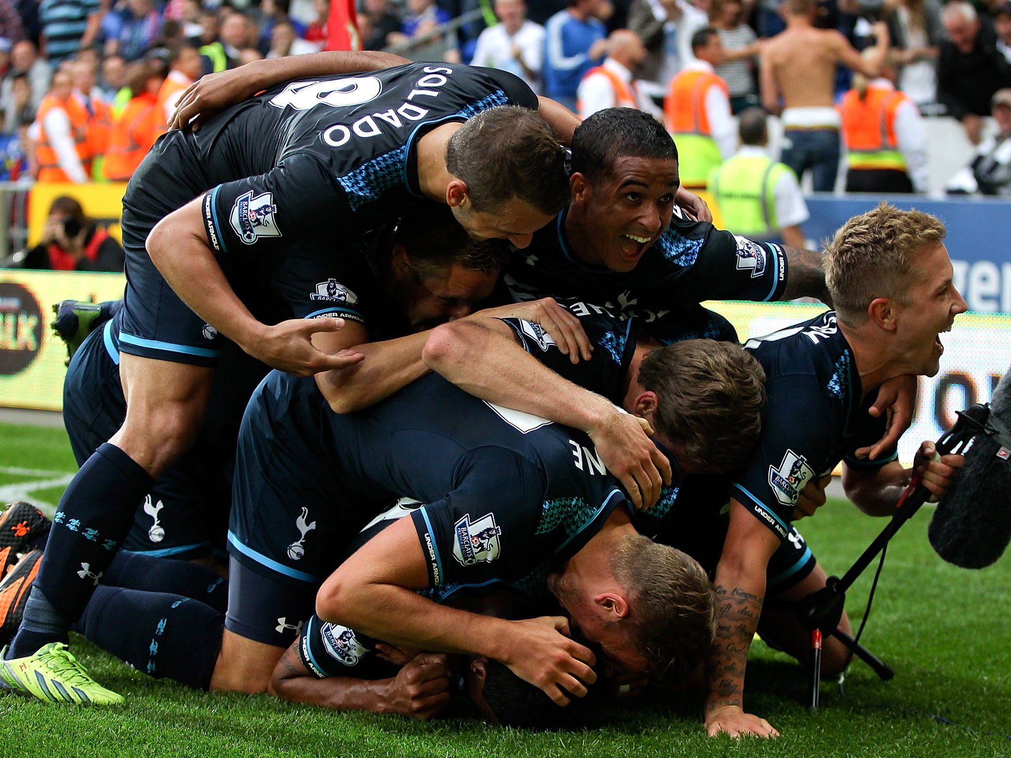 Tottenham celebrate a late winner in the Premier League against Cardiff City