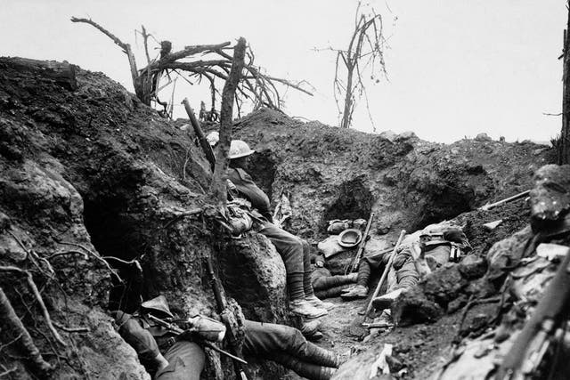 British infantrymen rest in a captured German trench during the Somme offensive of 1916. From The Great War: A Photographic Narrative (Jonathan Cape, £40)