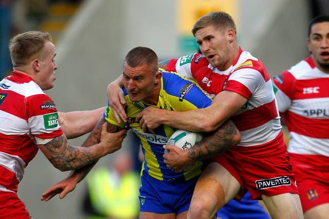 Paul Wood in the thick of the action against Wigan this season 