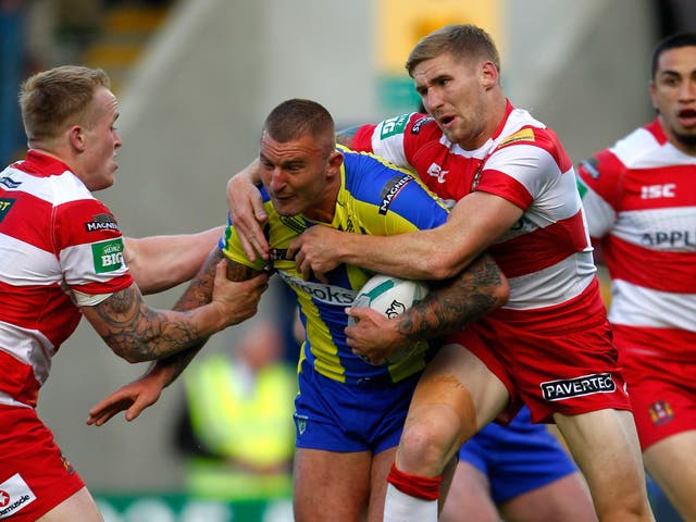 Paul Wood in the thick of the action against Wigan this season 