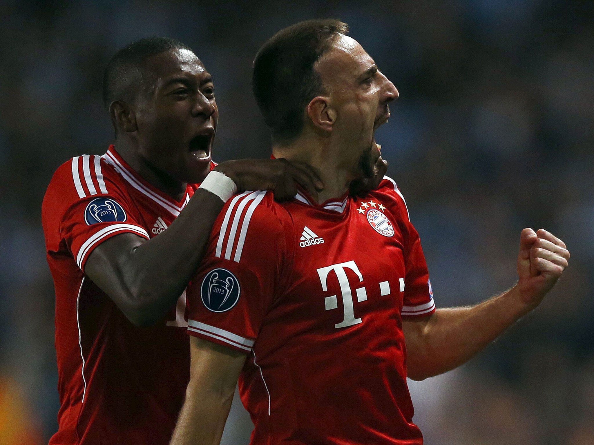 Bayern Munich's Franck Ribéry (right) is congratulated on scoring against Manchester City by team-mate David Alaba