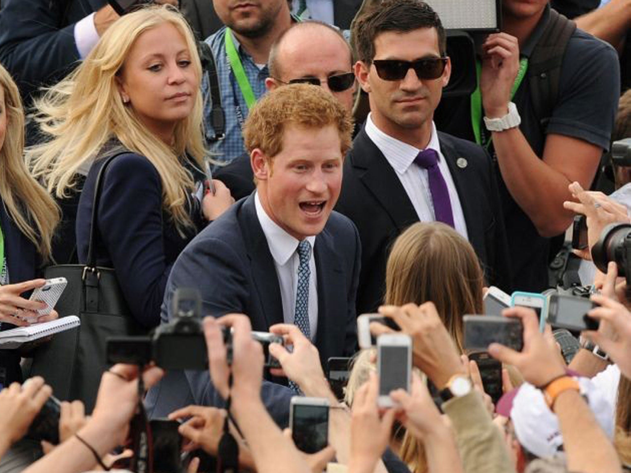 Prince Harry, who is in Sydney representing the Royal family at the International Fleet Review, meets members of the public during a walk about at Campbell's Cove in Sydney Harbour.