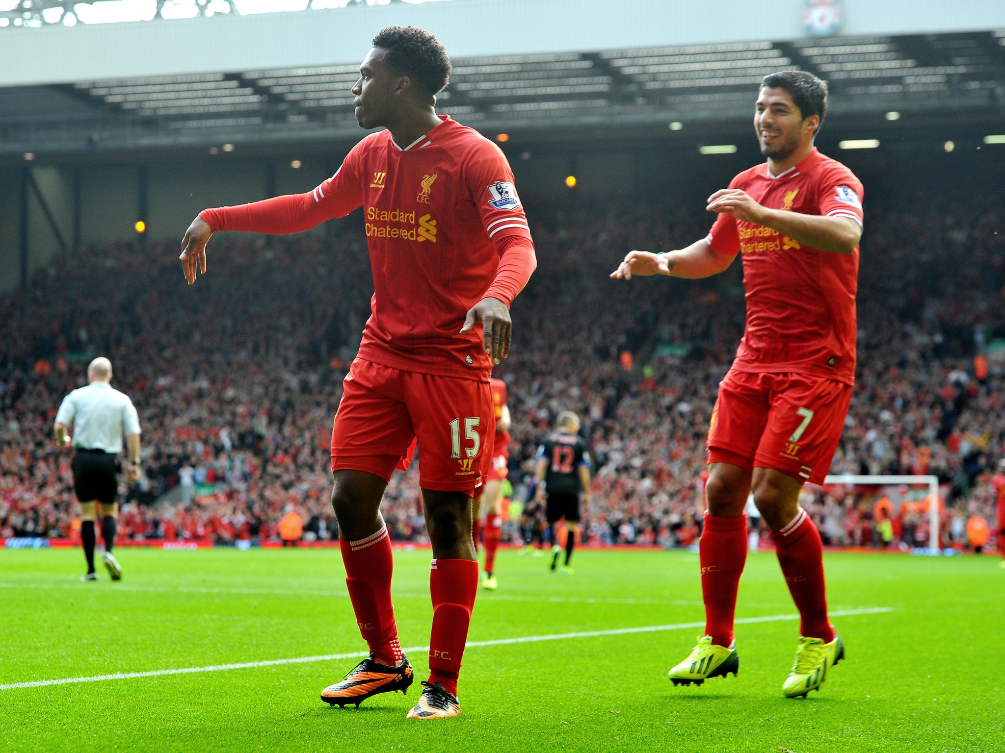 Daniel Sturridge and Luis Suarez celebrate after Liverpool go 2-0 up against Crystal Palace on Saturday