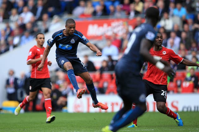 Loic Remy opens the scoring for Newcastle against Cardiff