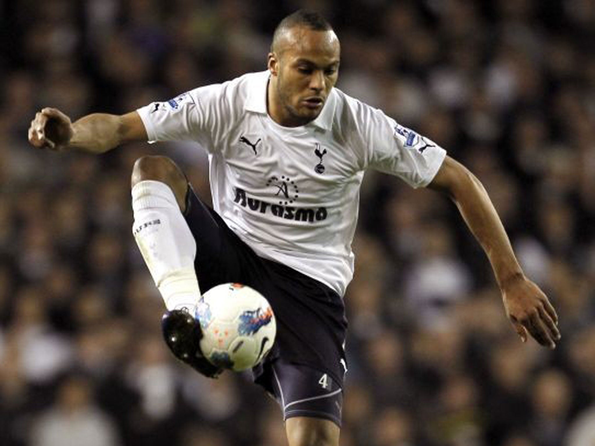 Balancing act: Kaboul knows he has his work cut out to return to the heart of Spurs defence