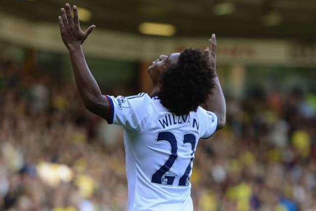 Willian celebrates his first goal for Chelsea against Norwich on Sunday