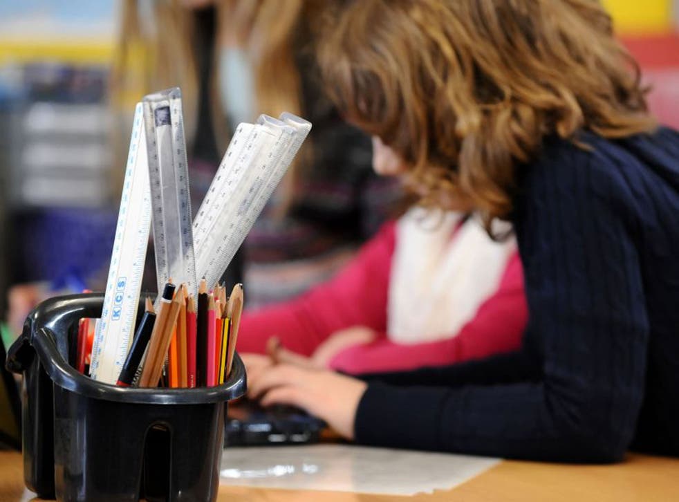 Children could face being at school for nine hours a day and see holidays cut under plans reportedly being examined by the Conservatives