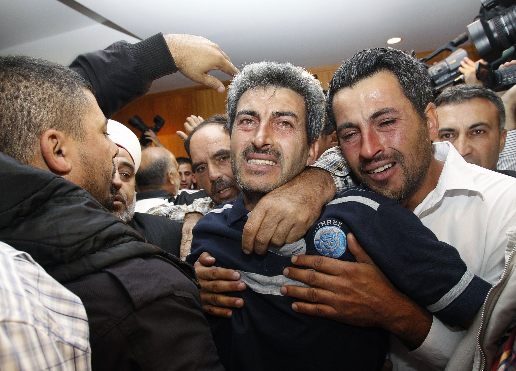 A survivor of the shipwreck arrives at Beirut airport