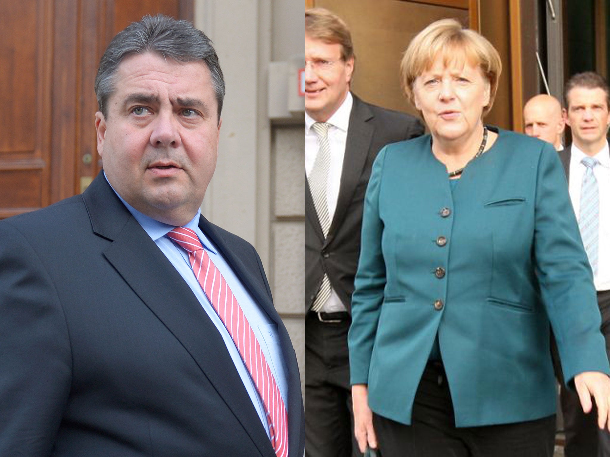 Social Democrat (SPD) leader Sigmar Gabriel, right, and German Chancellor Angela Merkel