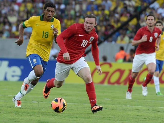 Could Wayne Rooney, right, and Paulinho meet in a future Uefa Cup of Nations?