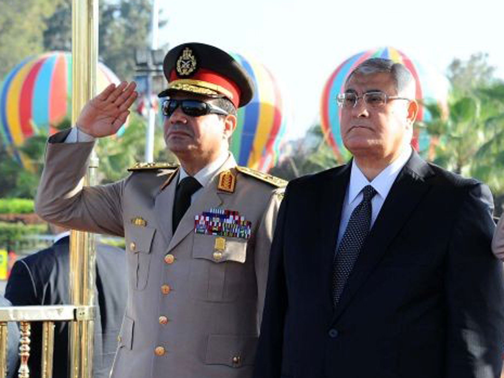 General Abdel-Fatah el-Sissi and interim President Adly Mansour