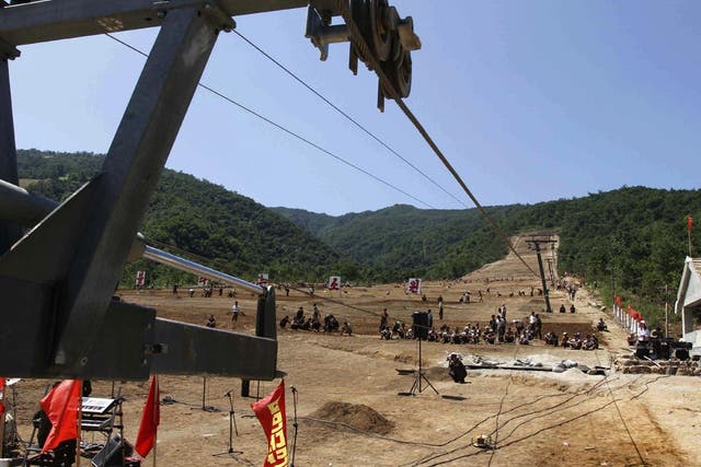 North Korean soldiers work on a building project to construct a ski resort at North Korea's Masik Pass. North Korean authorities have been encouraging a broader interest in sports in the country, both at the elite and recreational levels, as a means of en