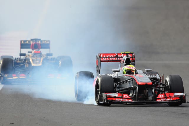 Sergio Perez of Mexico and McLaren locks his brakes while driving during the Korean Formula One Grand Prix