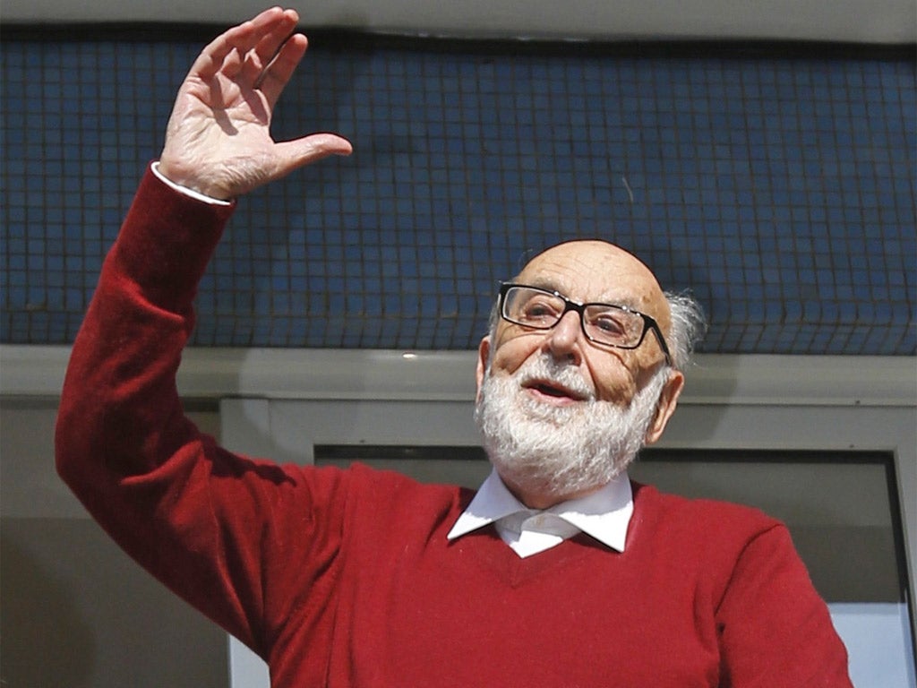 Nobel co-winner Francois Englert celebrates in Brussels