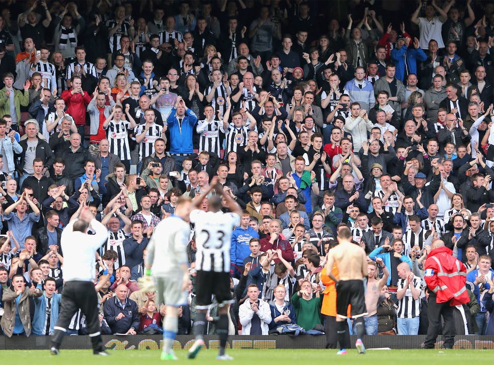 Newcastle united fans applaud their team at West Ham’s Boleyn Ground