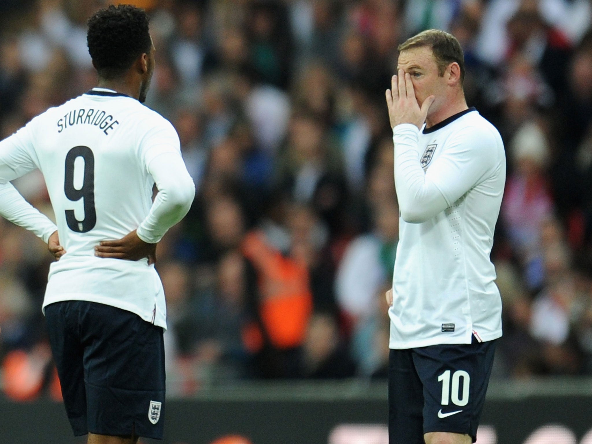 Daniel Sturridge (left) and Wayne Rooney in action for England against Ireland in May