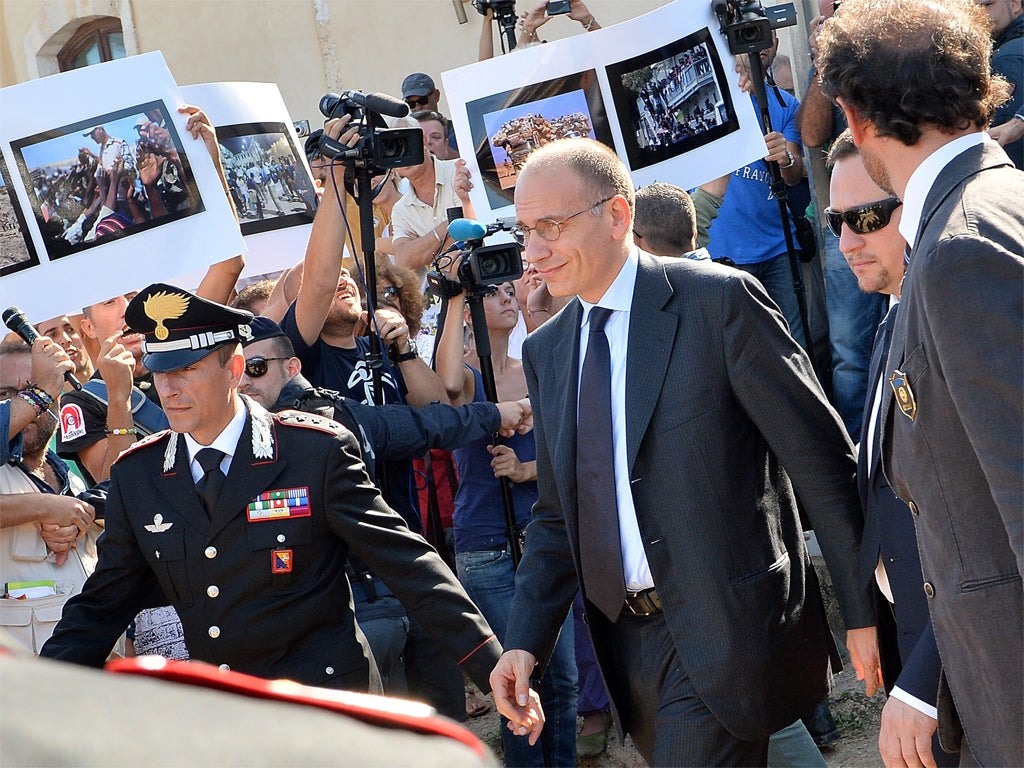 Protesters heckle Enrico Letta in Lampedusa