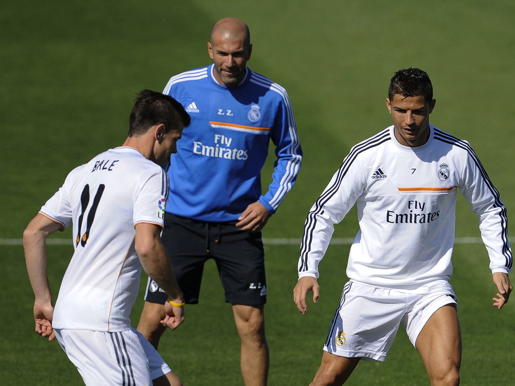 Zinedine Zidane training with Gareth Bale (left) and Cristiano Ronaldo last month