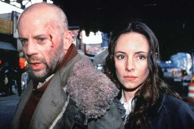 Bruce Willis as James Cole and Madeleine Stowe as Kathryn Railly in film Twelve Monkeys