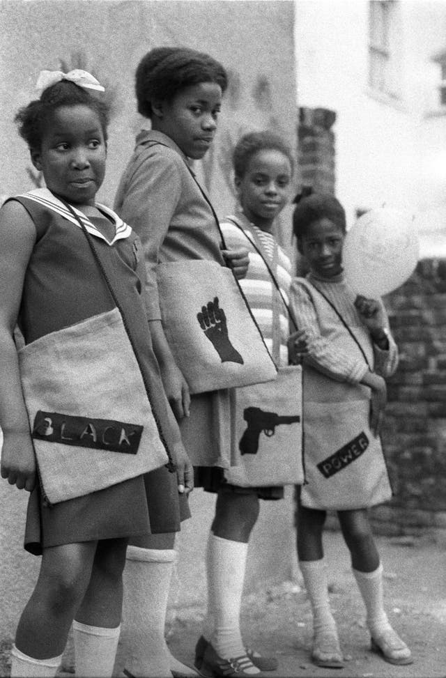 A group of schoolgirls carry radical school bags