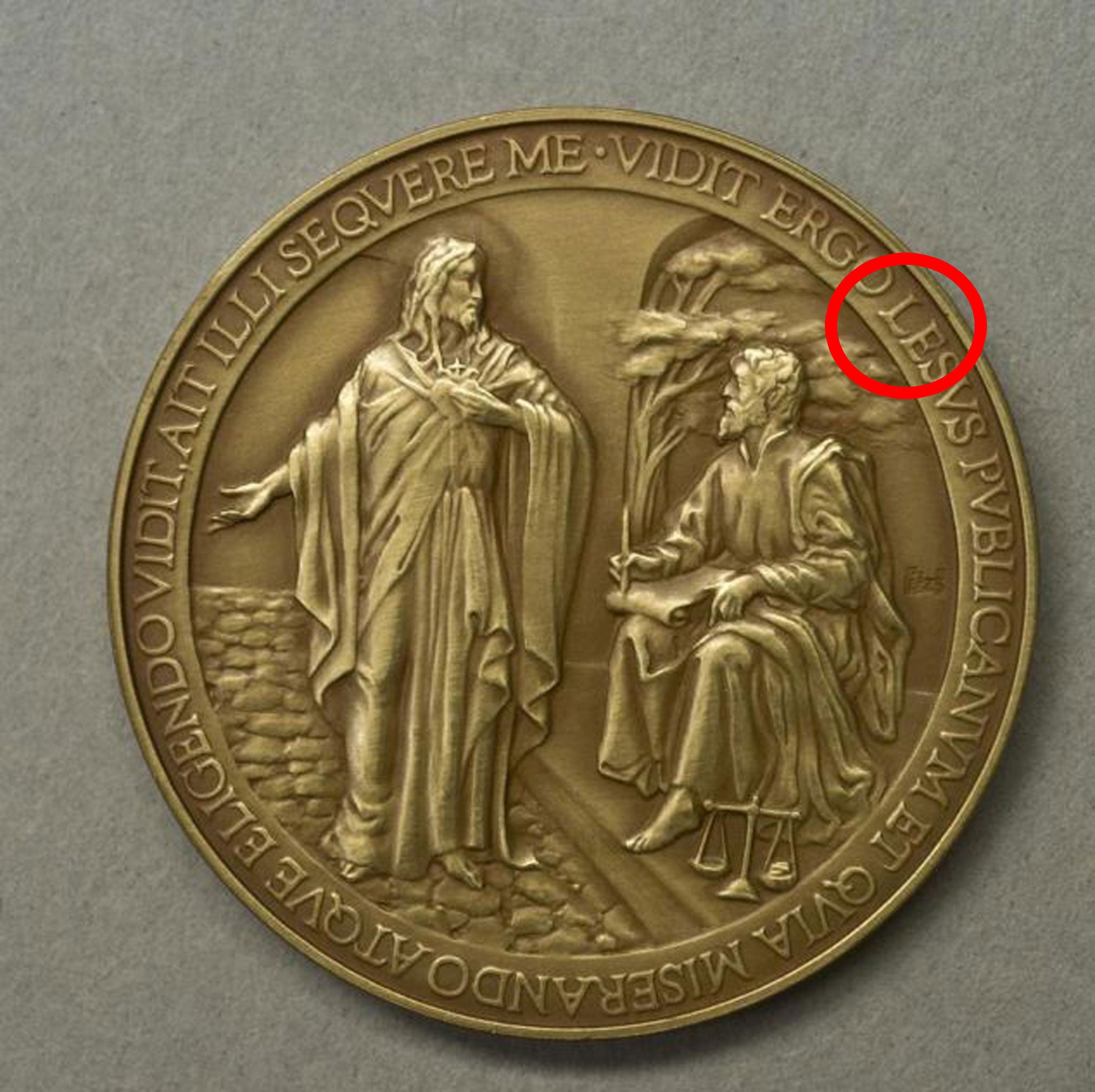 Vatican misspells Jesus on Pope Francis commemorative coins The