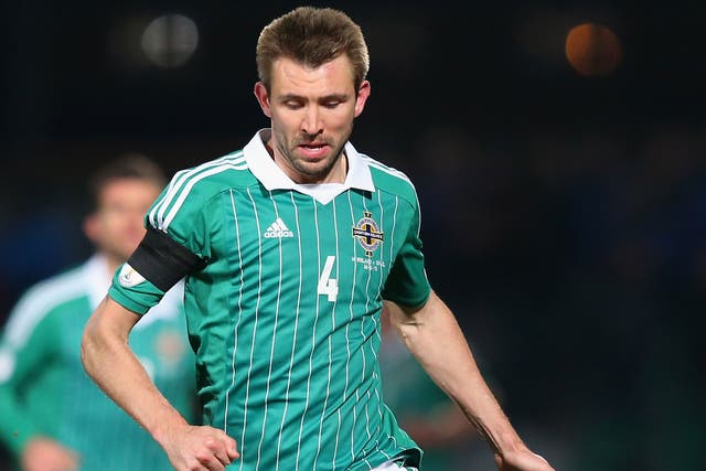 Gareth McAuley is expected to start for Northern Ireland