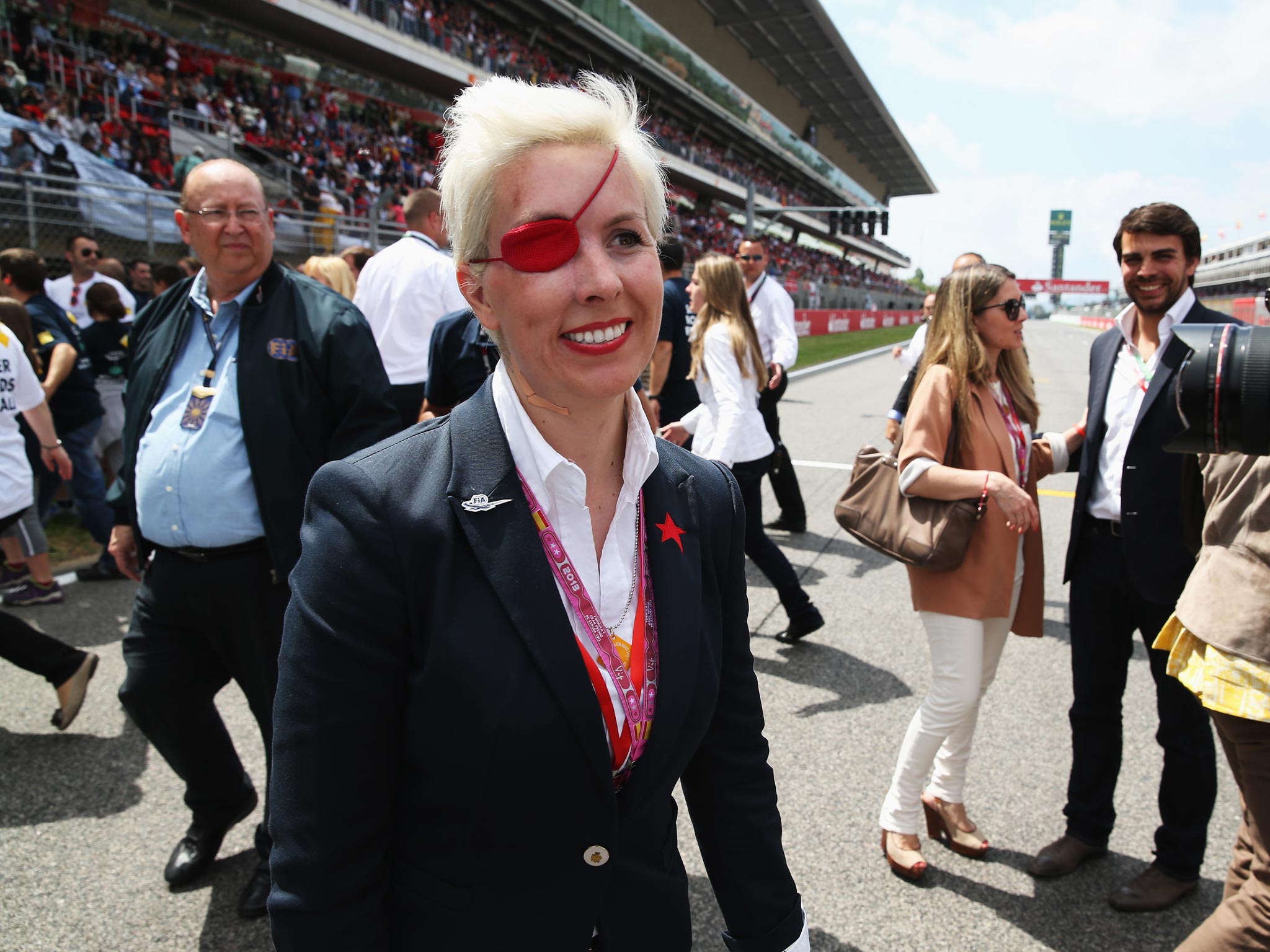 María de Villota is seen on the grid before the Spanish Formula One Grand Prix at the Circuit de Catalunya back in May
