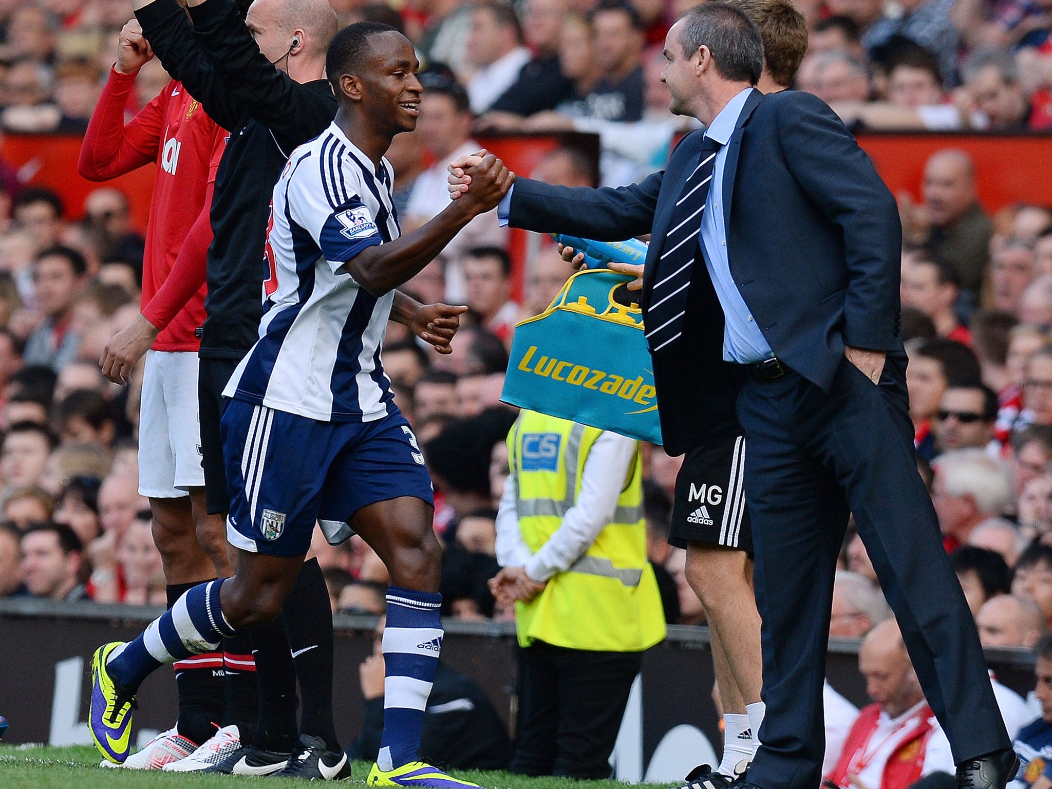 Saido Berahino is congratulated by West Brom manager Steve Clarke