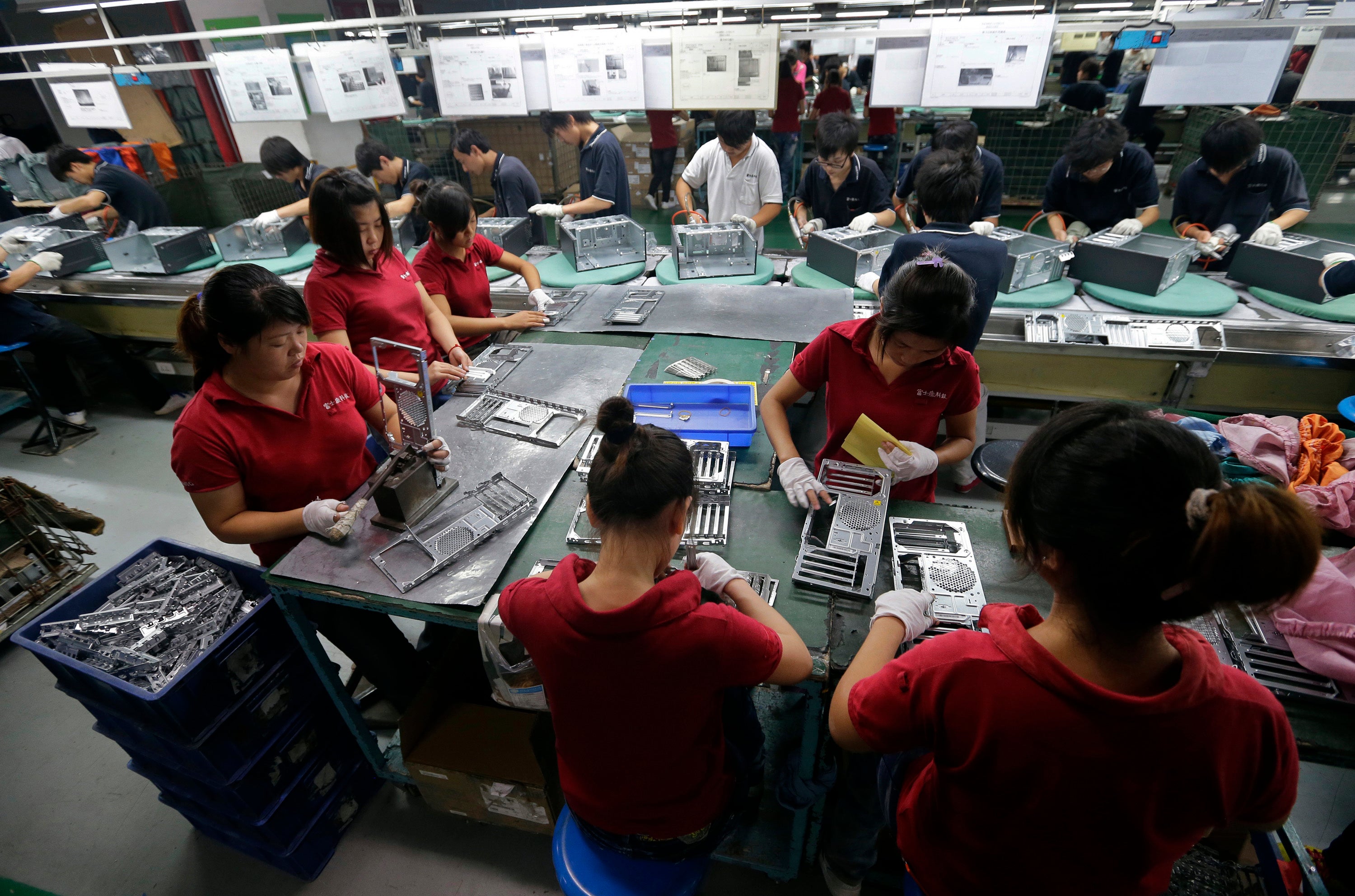 Employees work at a Foxconn factory in Wuhan, Hubei province.
