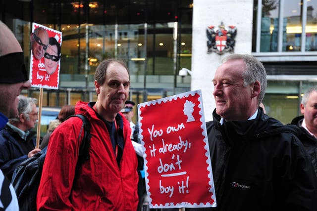 Protesters take part in a demonstration by the Communication Workers Union against Royal Mail privatisation outside the London Stock Exchange