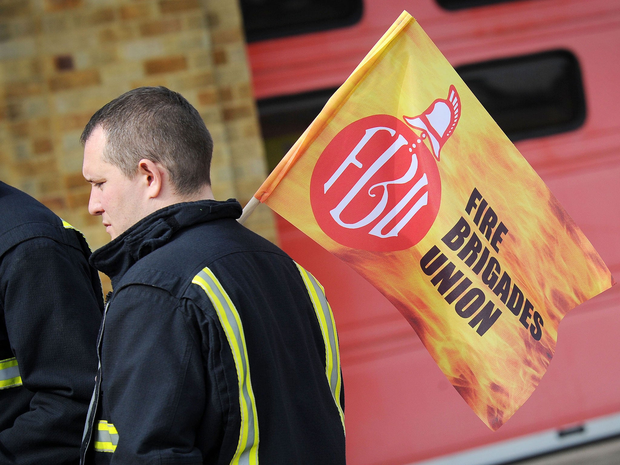 Firefighters and Fire Service staff from Wiltshire gather on the picket line outside Drove Road fire station in Swindon