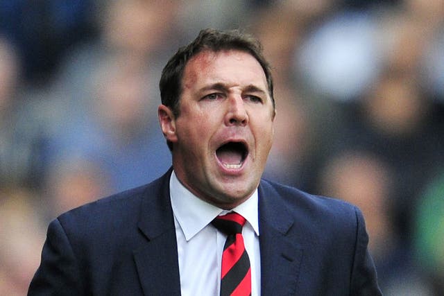Cardiff City manager Malky Mackay has been given a vote of confidence from owner Vincent Tan 