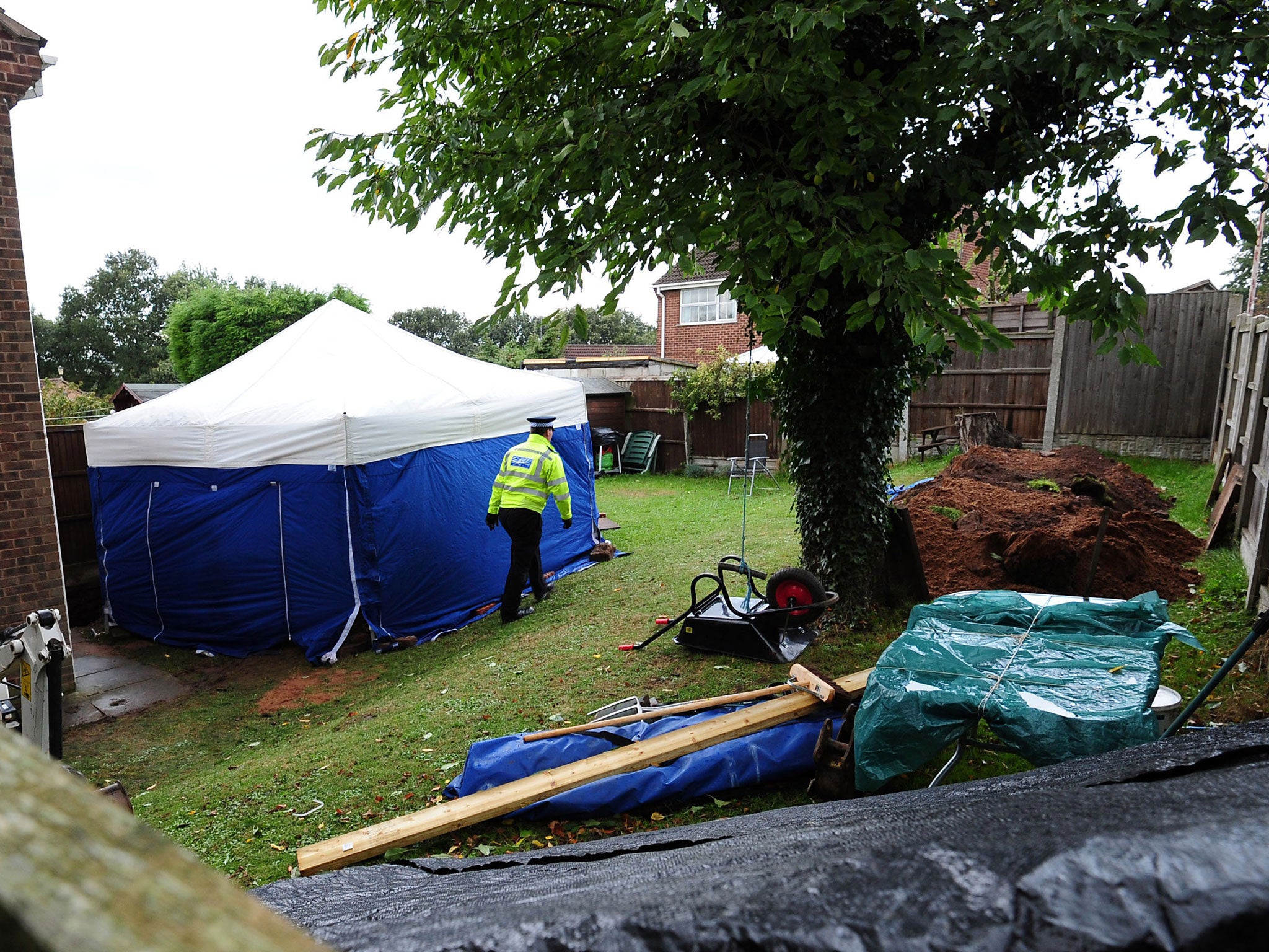 The remains of two people have been found in the garden of a house in Blenheim Close, Forest Town, near Mansfield