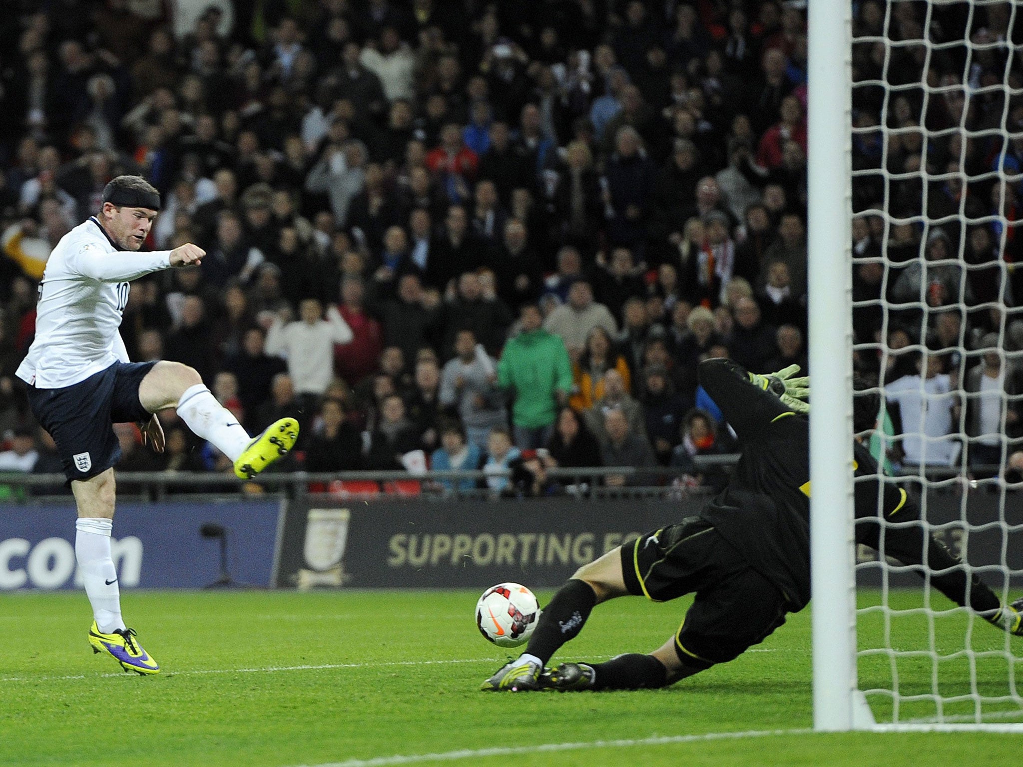 Wayne Rooney opens the scoring for England at Wembley