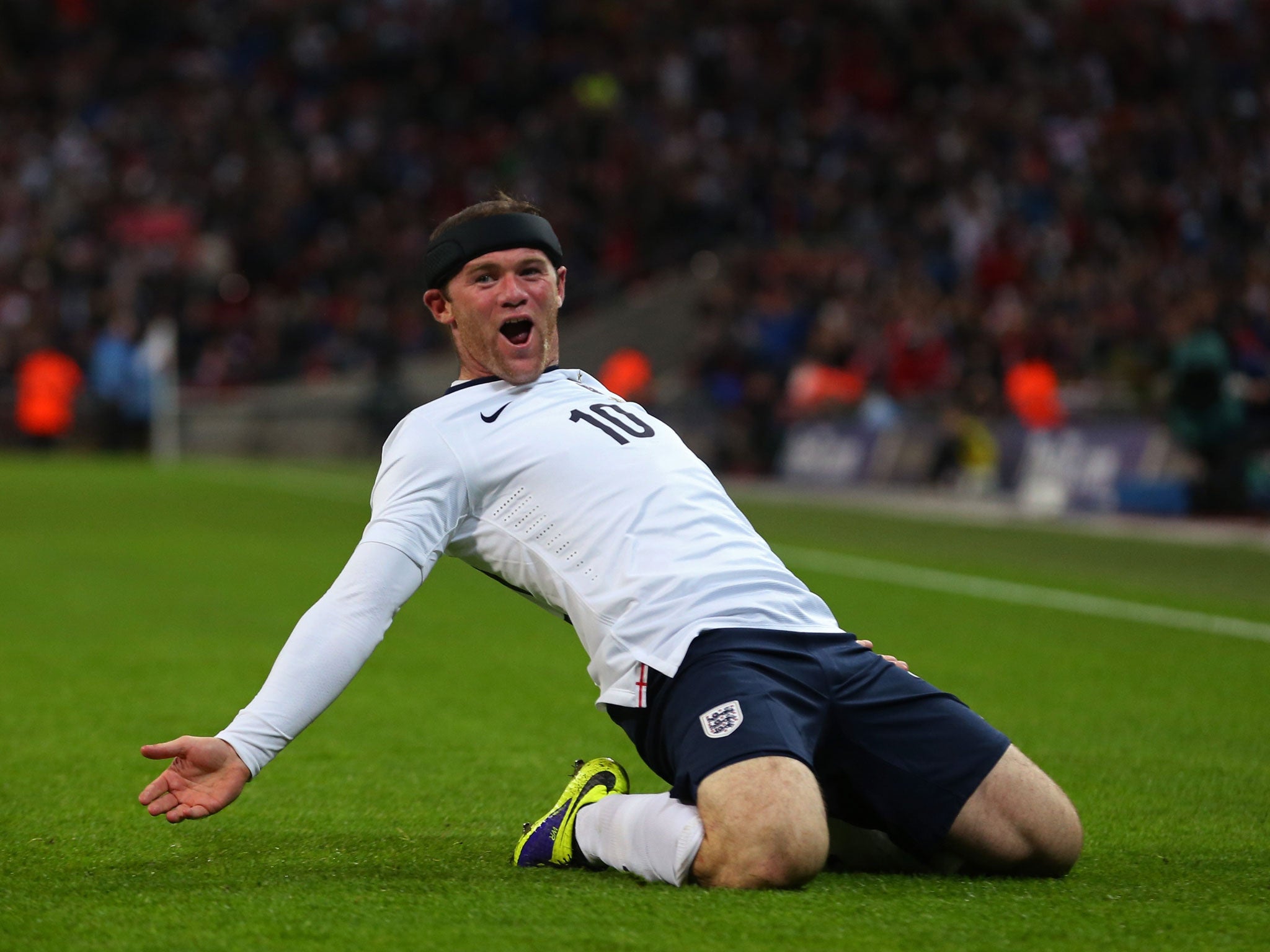 Wayne Rooney celebrates for England