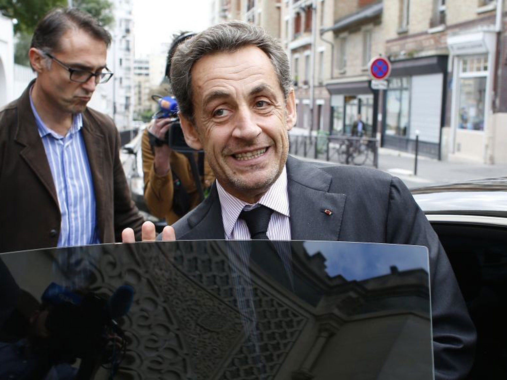 All smiles: With the Bettencourt affair receding, Mr Sarkozy is ready to plan his return