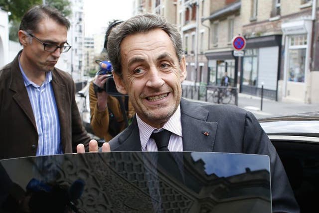 All smiles: With the Bettencourt affair receding, Mr Sarkozy is ready to plan his return