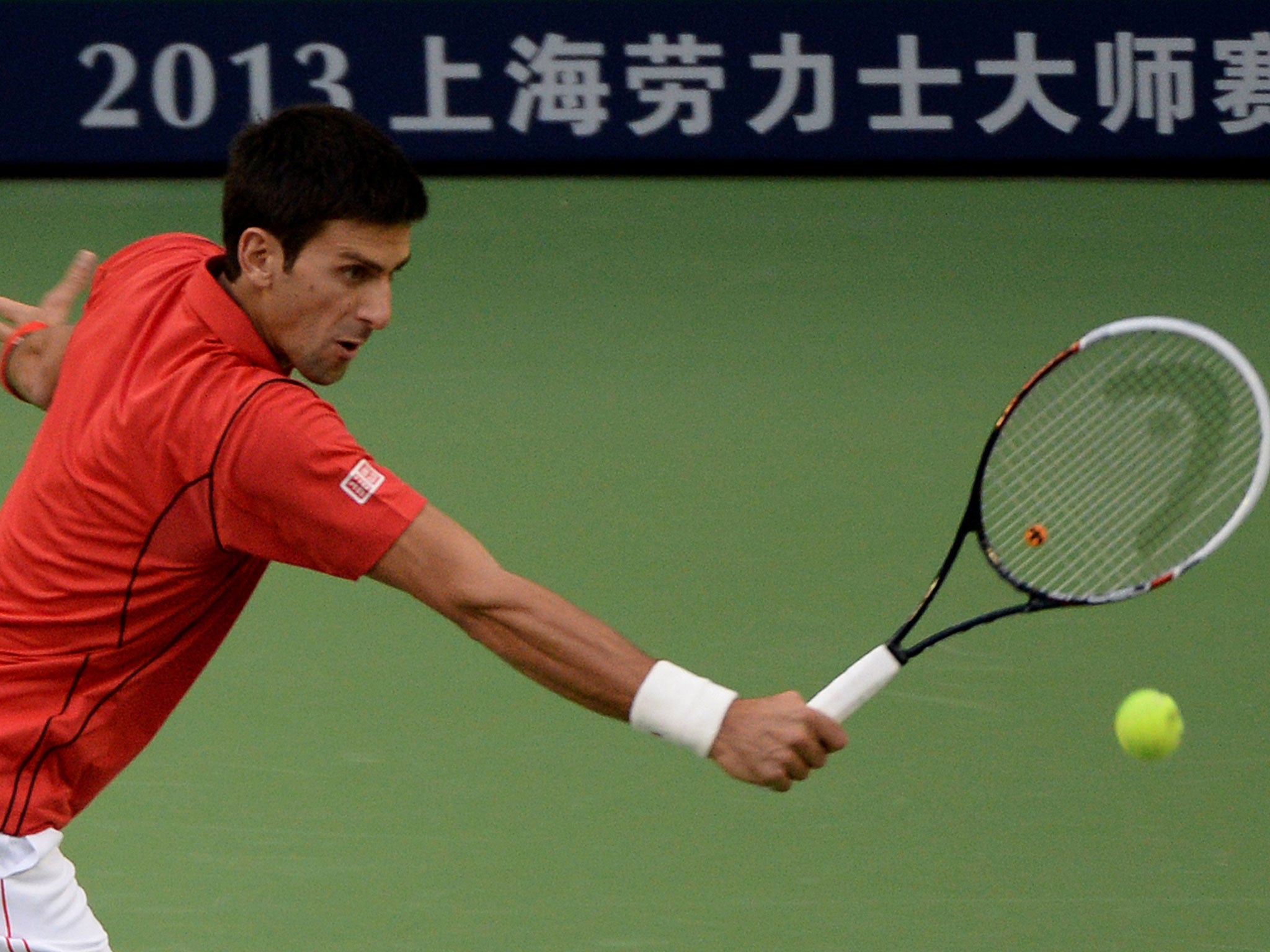 Novak Djokovic retained his Shanghai Masters title by beating Juan Martin del Potro