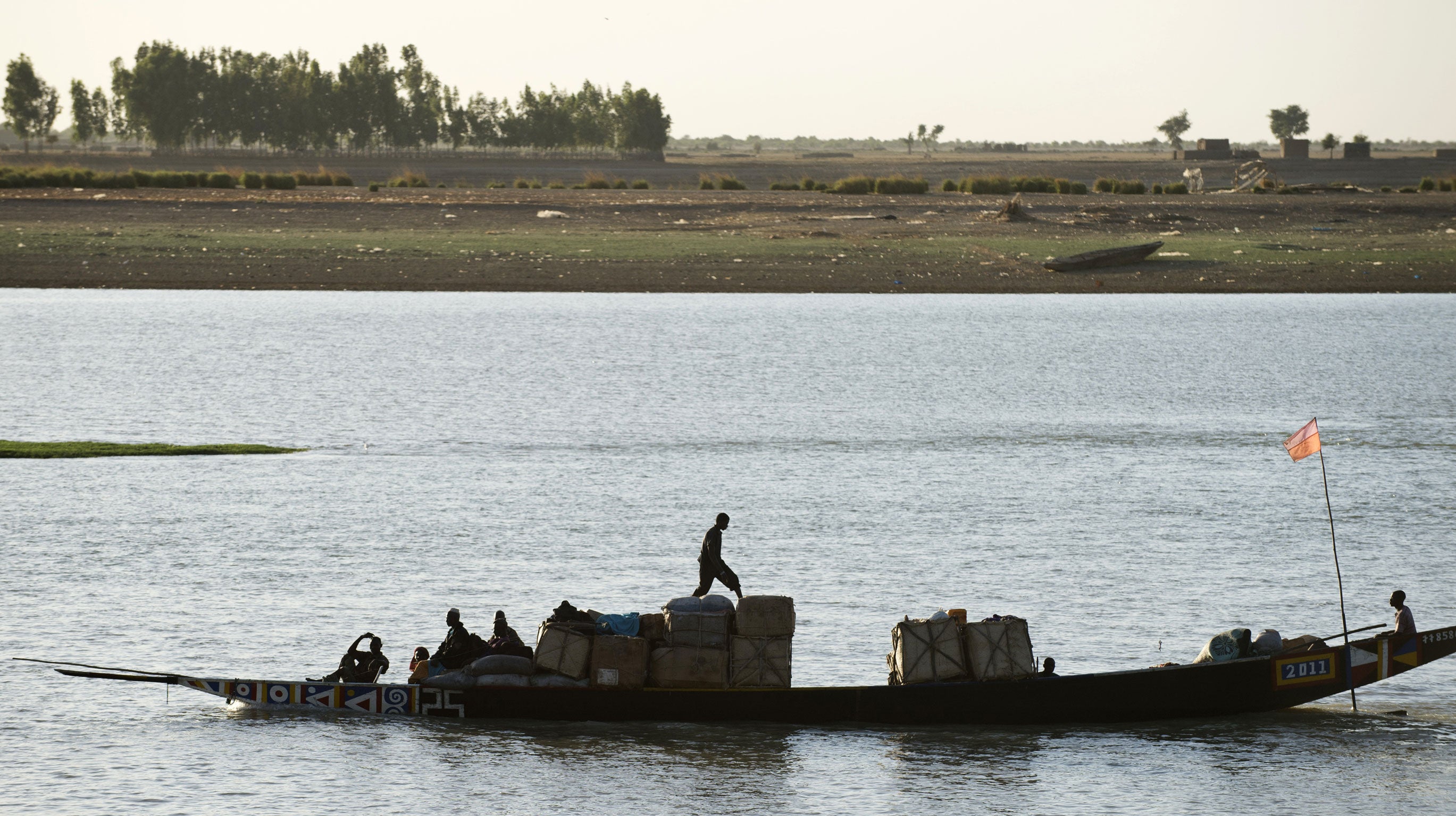 A 'Pinasse' boat approaching the commercial port of Mopti, Mali, on the Niger River