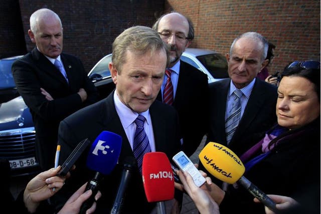 Taoiseach Enda Kenny speaks to members of the media. He has confirmed that Ireland will exit its strict bailout programme by the end of the year
