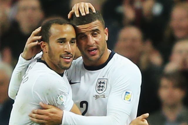 Andros Townsend celebrates with Kyle Walker after the former scored on his England debut