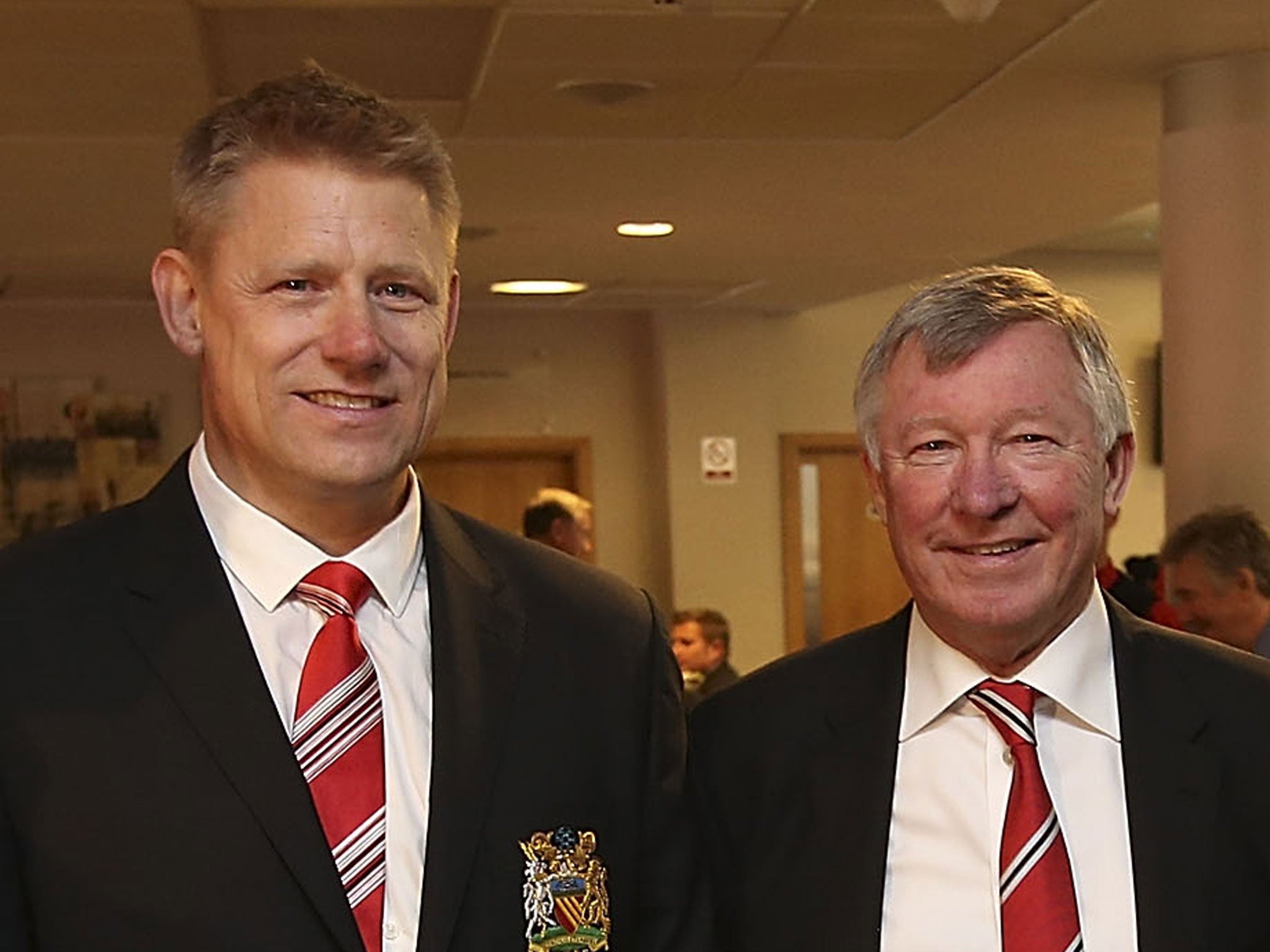 Peter Schmeichel (left) poses with his former manager at Manchester United, Sir Alex Ferguson