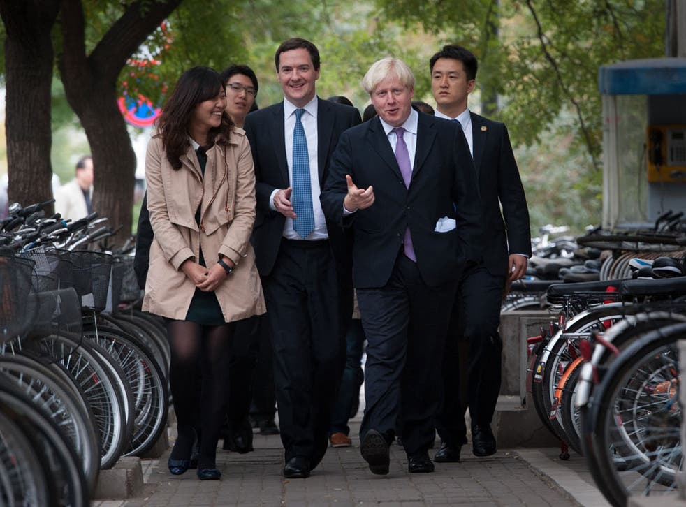 George Osborne, left, and Boris Johnson meet students at Peking University