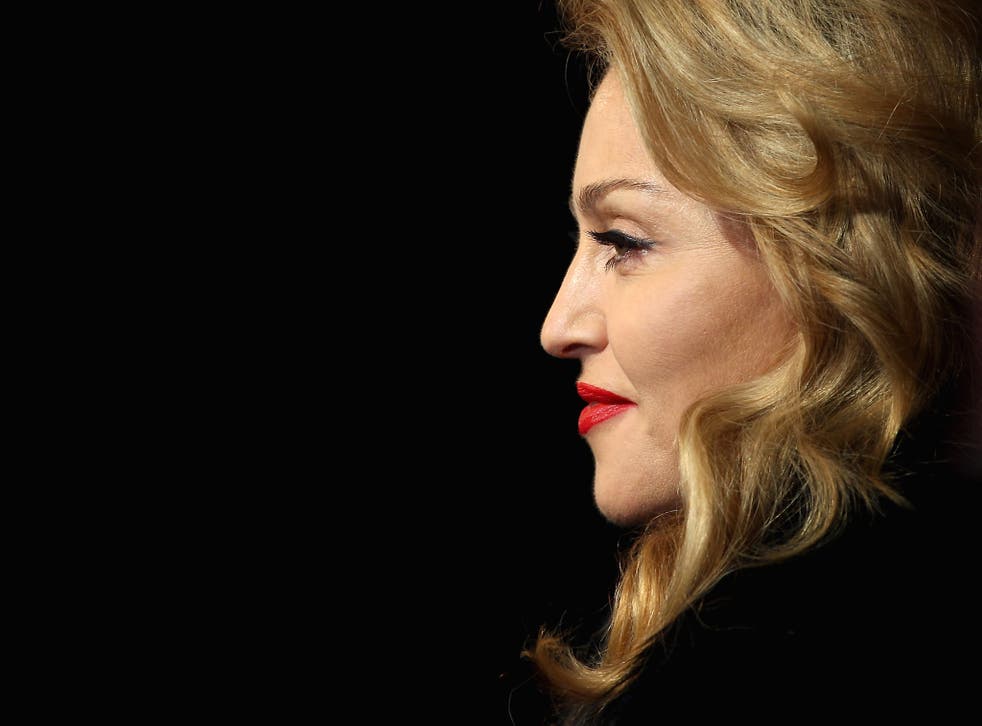 Madonna has been banned from a chain of US cinemas for texting during a film