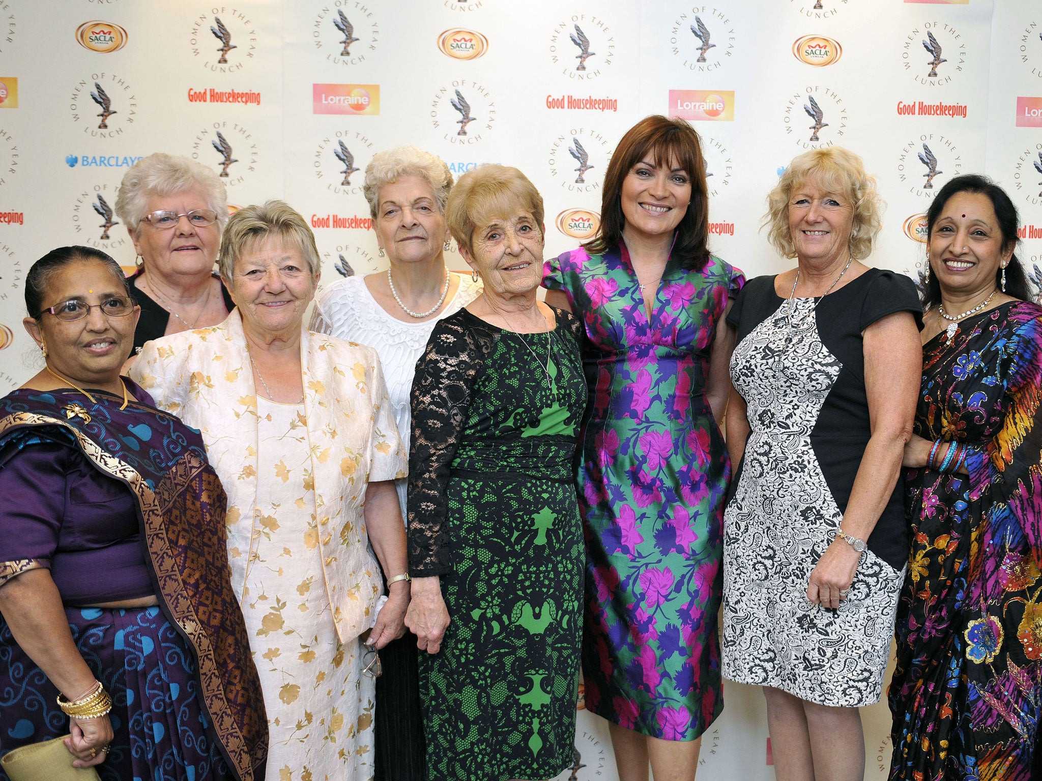 Presenter Lorraine Kelly (third right) stands with 'Dagenham Women' members of the former machinists plant at Ford Motor Company in Dagenham