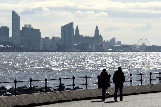 A toddler was rescued after falling into the River Mersey