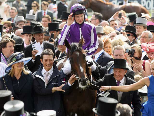 Camelot and jockey Joseph O'Brien in the winner's enclosure after last year's Derby