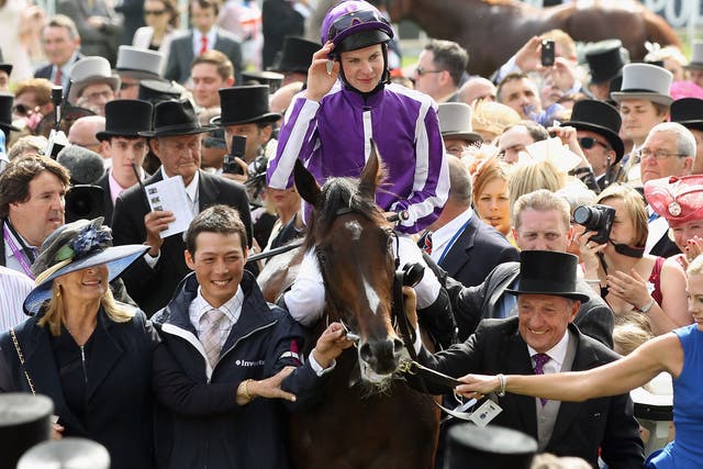 Camelot and jockey Joseph O'Brien in the winner's enclosure after last year's Derby