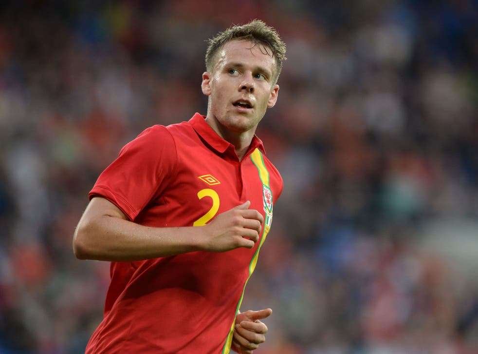 Reading and Wales defender Chris Gunter will make his 50th appearance for his country against Belgium tonight