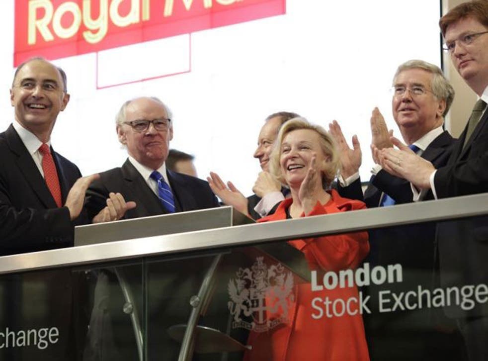 London Stock Exchange group CEO Xavier Rolet (left), Royal Mail CEO Moya Greene (centre), business minister Michael Fallon (second right) and Chief Secretary to the Treasury Danny Alexander (right) open trading at the London Stock Exchange this morning to